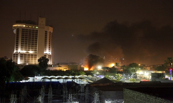 Smoke rises from the site of car bomb attack in Baghdad