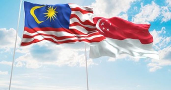 malaysia-singapore-flags-waving-sky-260nw-378066214