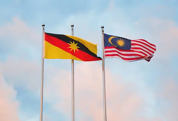 malaysian-flag-next-to-a-sarawakian-flag.jpg.png